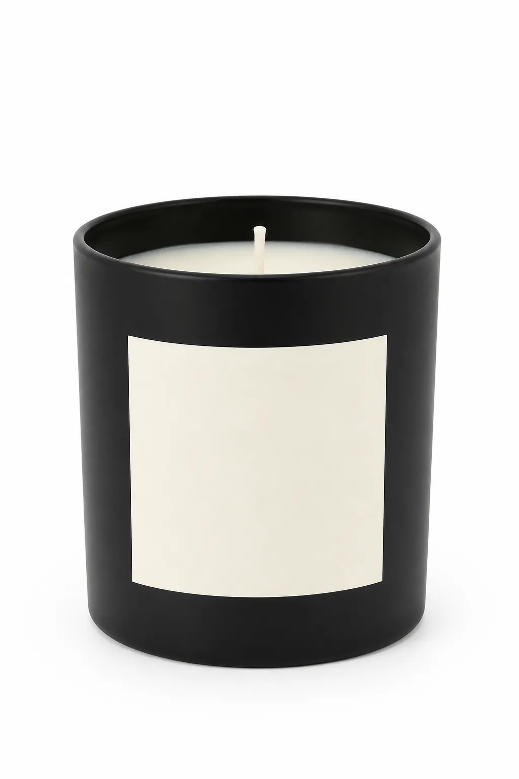 Black matte candle jar with a blank cream label on white